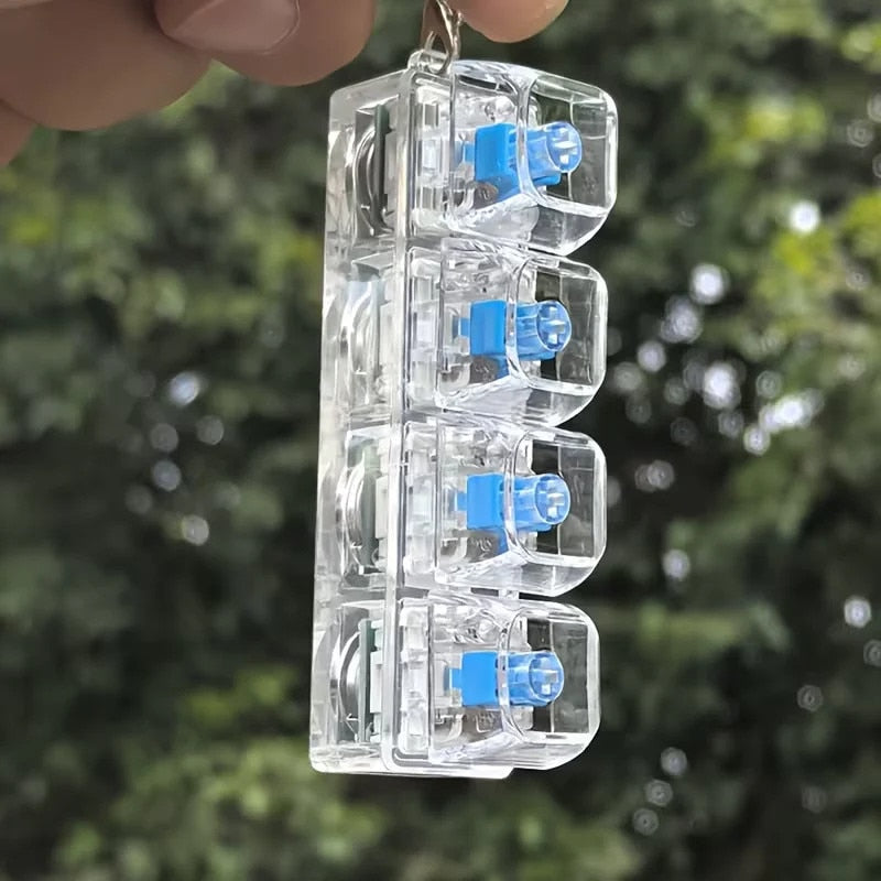 Breloc Antistres cu 4 Taste Mecanice, Jucarie Fidget cu Lumini LED Multicolore, Clicky Switch, Transparent